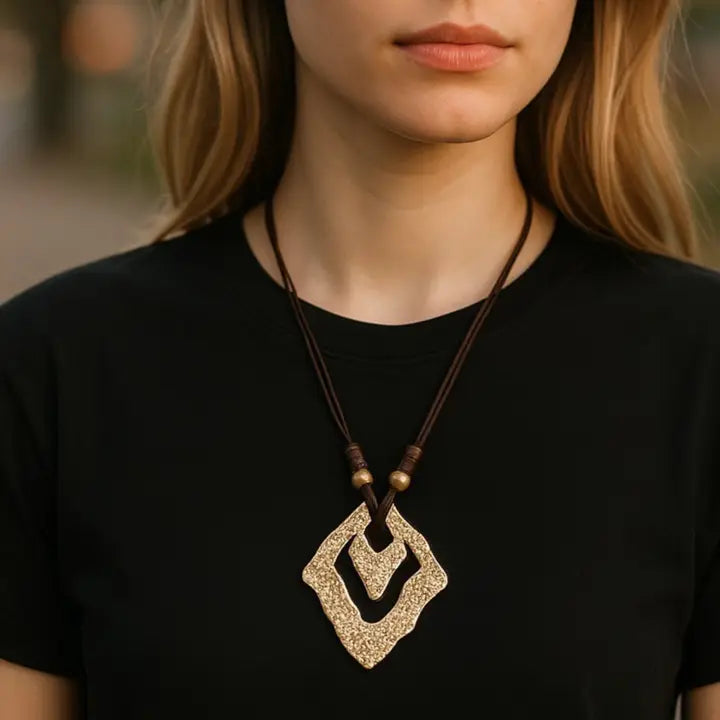 Vintage Gold Sculpted Pendant Necklace on Mocha Brown Leather Cord