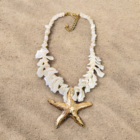 Ivory Spiral Seashell & Large Gold Starfish Pendant Necklace